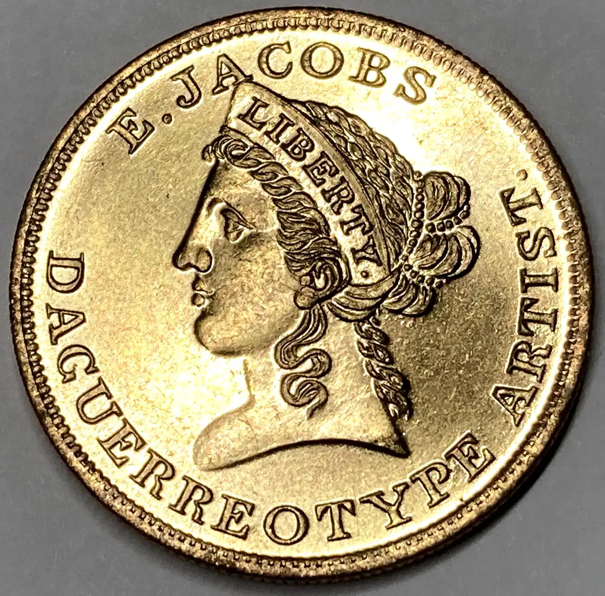 Merchant-Token---E.-Jacobs---Miller-La-34